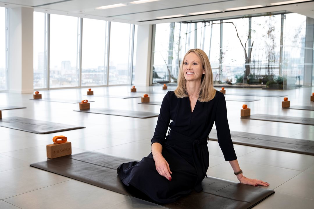 Kay Harvey sitting in The Shard's yoga space.